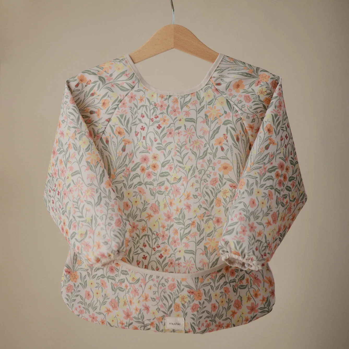 Mushie Long Sleeve Bib | Pastel Blooms