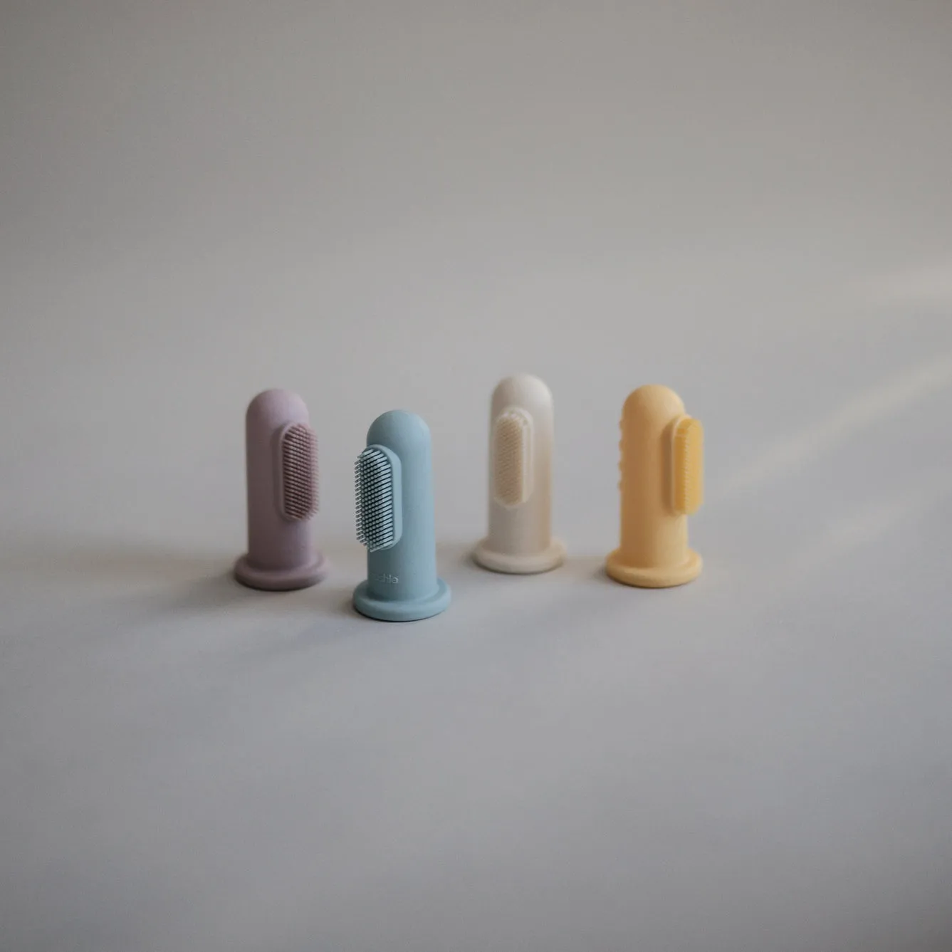 Mushie Toothbrush Finger | Powder Blue   Daffodil